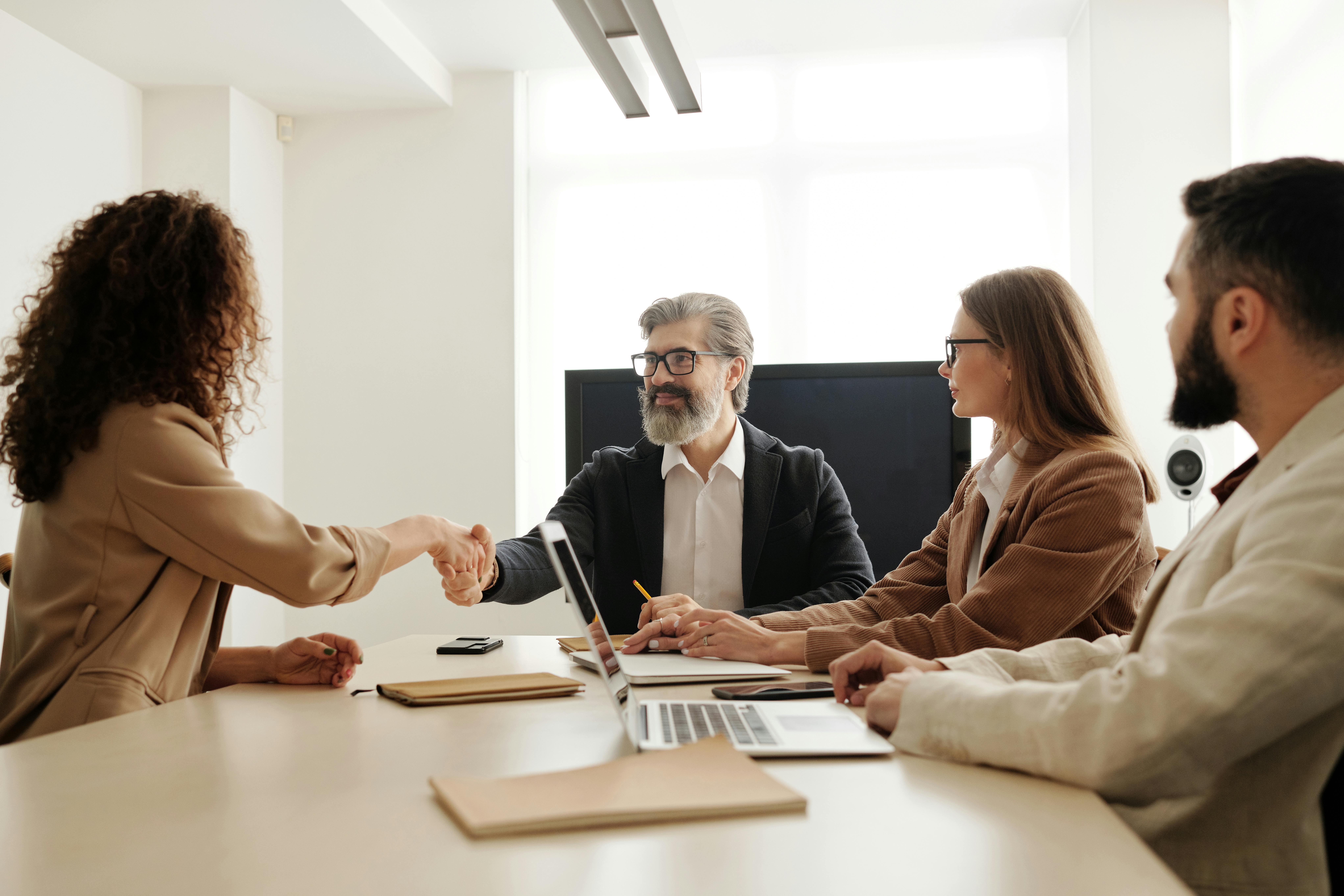 Group of managers going through an interview process