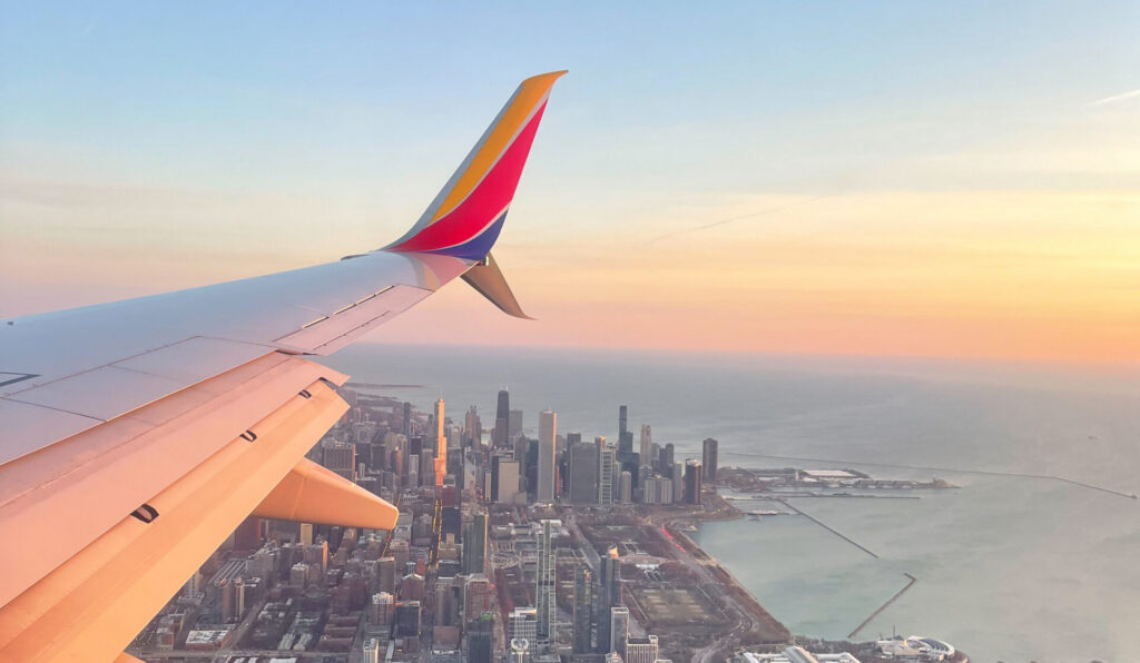 southwest airlines in the sky above city